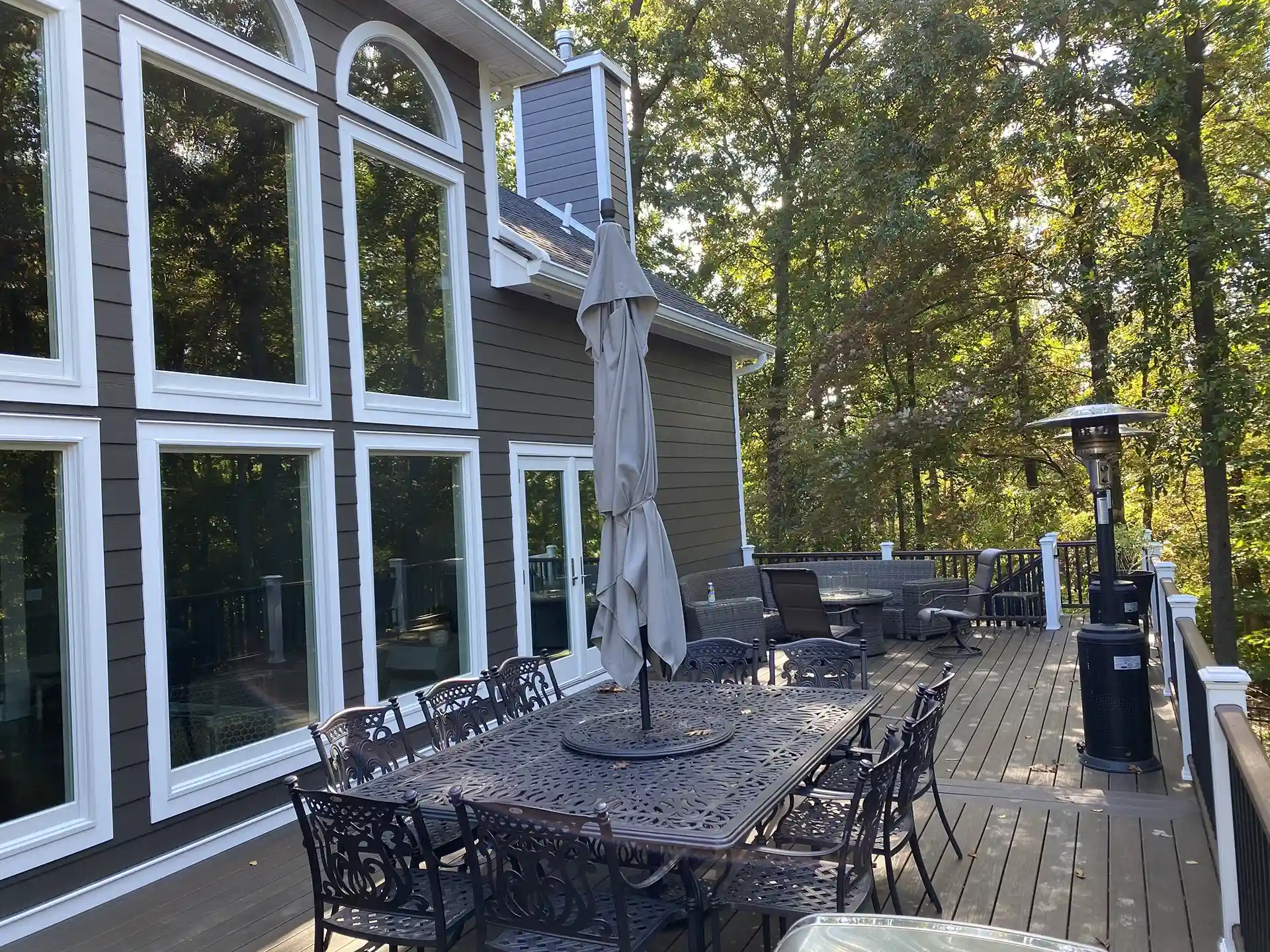 photo of a raised custom deck with outdoor furniture