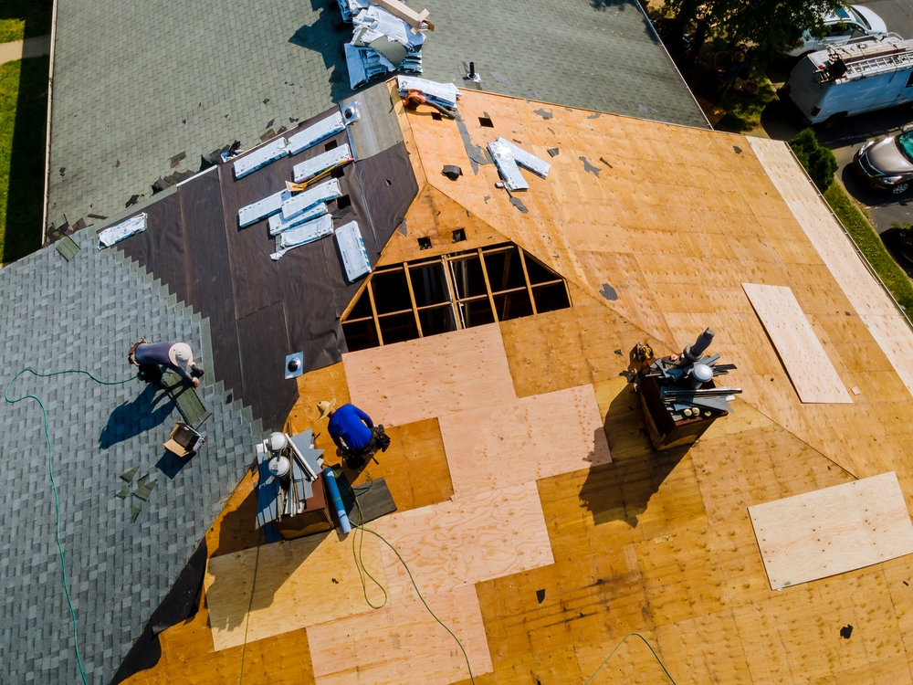 roofing contractors installing new roof on a home