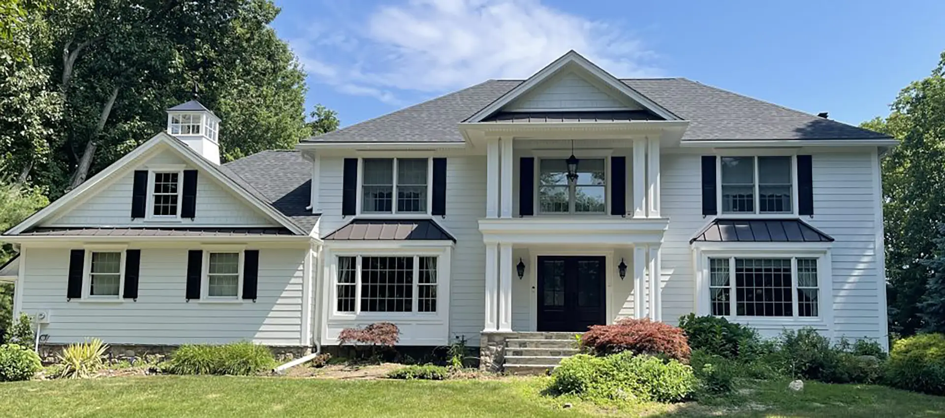 photo of a home exterior with portico