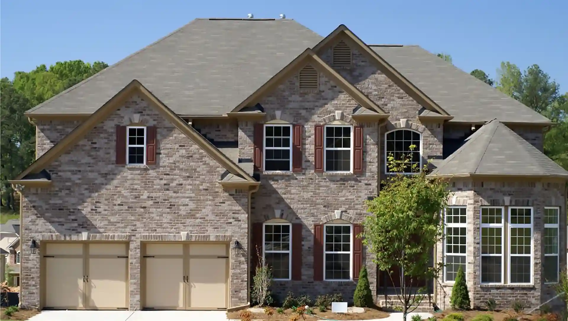 home exterior with roofing 