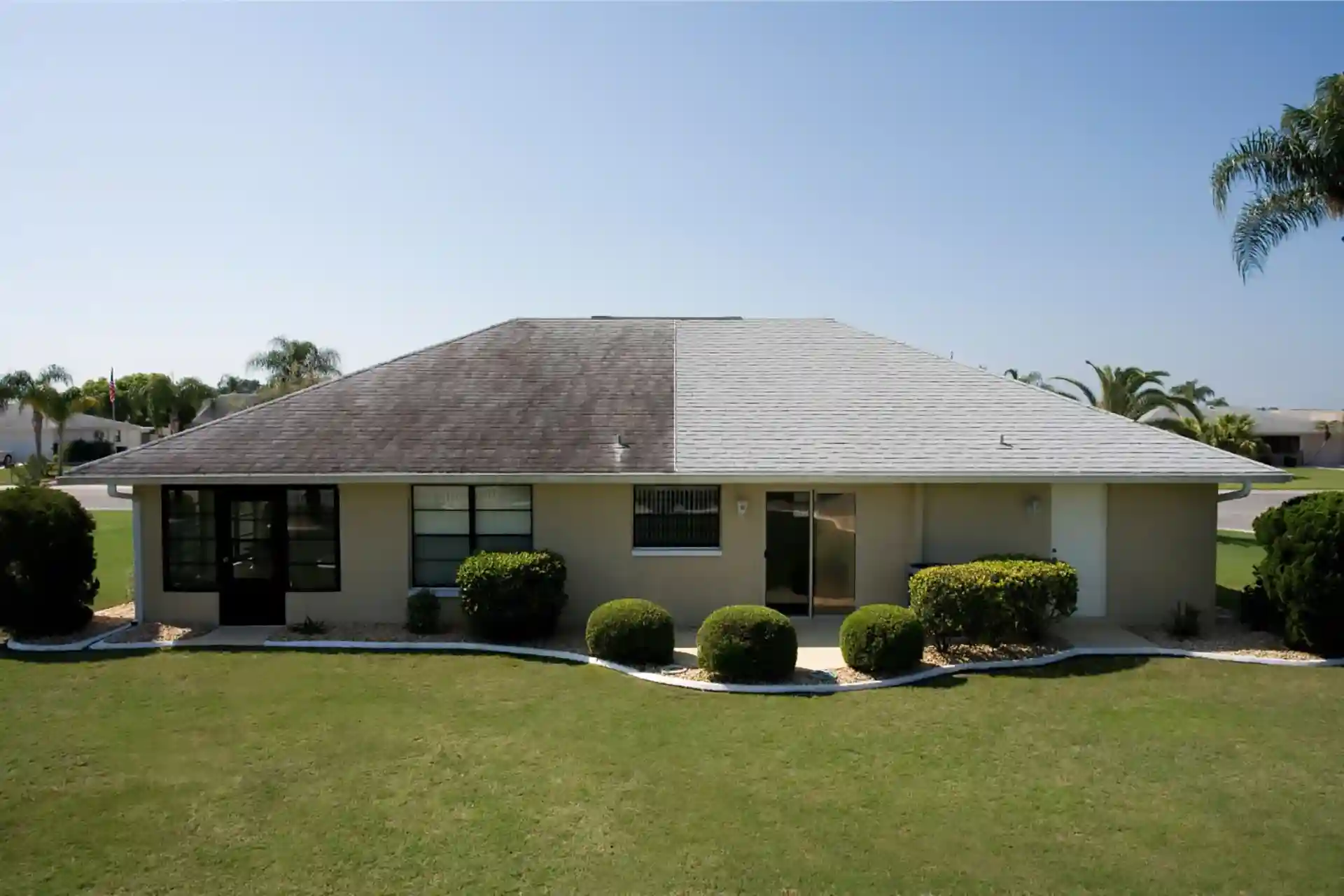 photo of a roof being replaced. Half of the roof is done. 